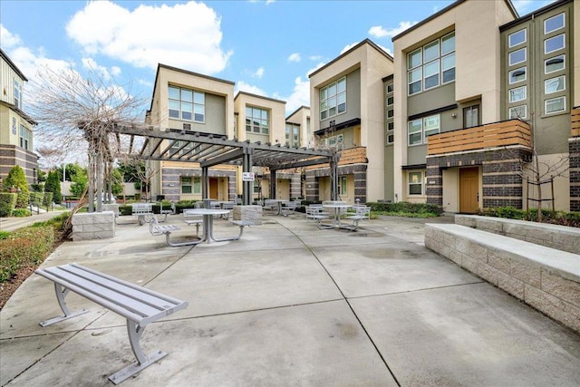 view of home's community featuring a pergola