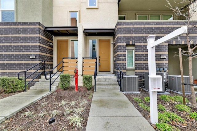 property entrance featuring central air condition unit