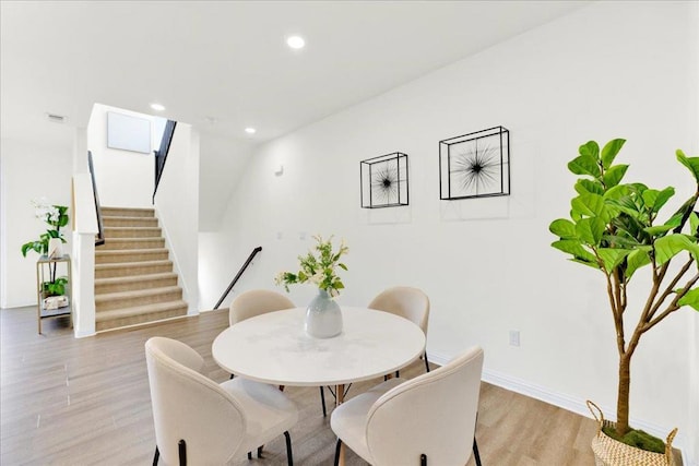 dining space with light wood-type flooring