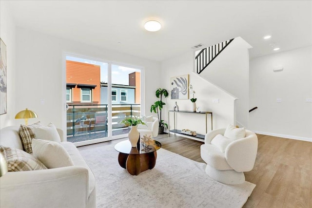 living room with wood-type flooring