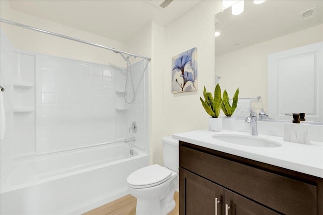 full bathroom featuring vanity, toilet, and shower / bath combination