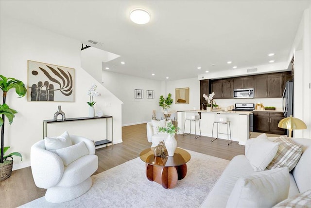 living room with hardwood / wood-style floors