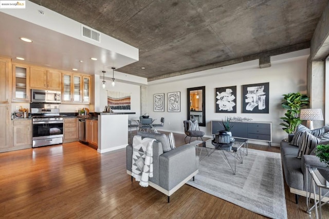 living room featuring dark hardwood / wood-style flooring