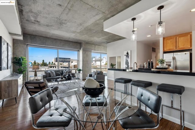 dining area featuring dark hardwood / wood-style floors