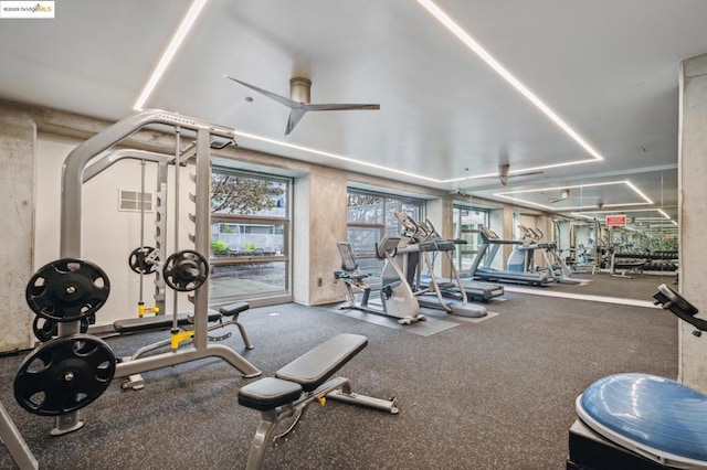 workout area featuring ceiling fan