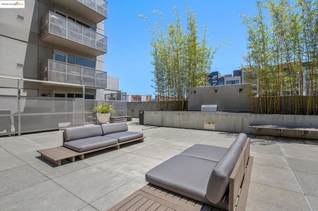 view of patio featuring area for grilling and an outdoor hangout area