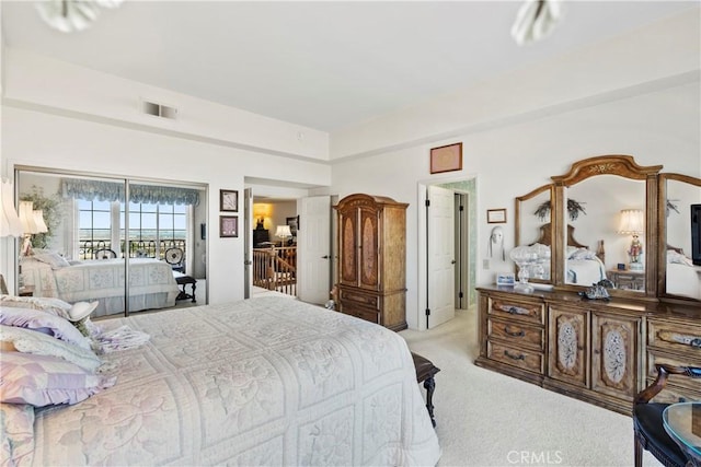 carpeted bedroom featuring access to outside