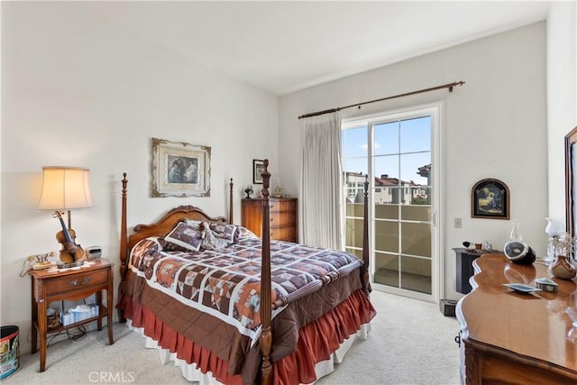 bedroom featuring carpet and access to exterior