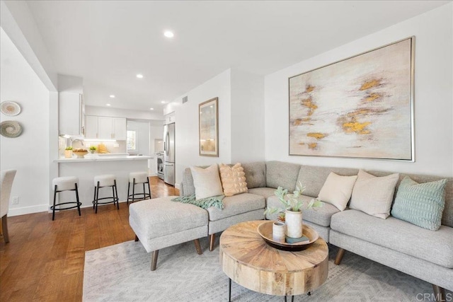 living room with dark wood-type flooring