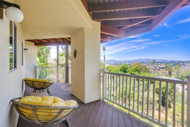 balcony featuring a mountain view