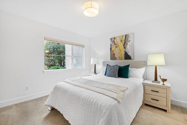 bedroom with light carpet