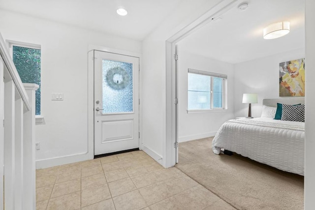 bedroom with light carpet