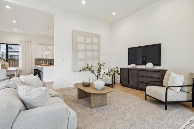 living room with light hardwood / wood-style floors