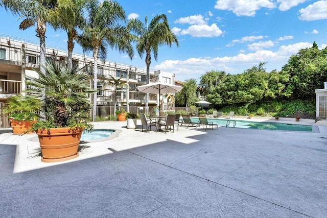 view of swimming pool featuring a patio