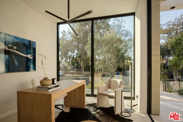 office space featuring expansive windows