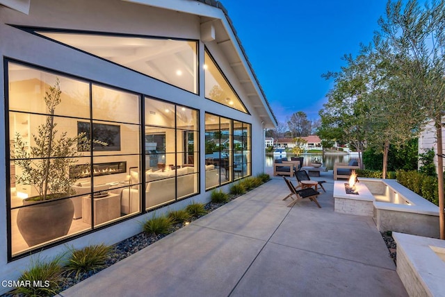 view of patio featuring a fire pit