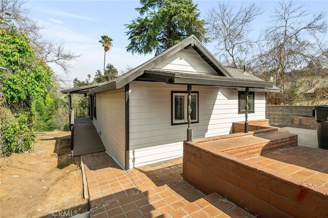 view of home's exterior featuring a patio area