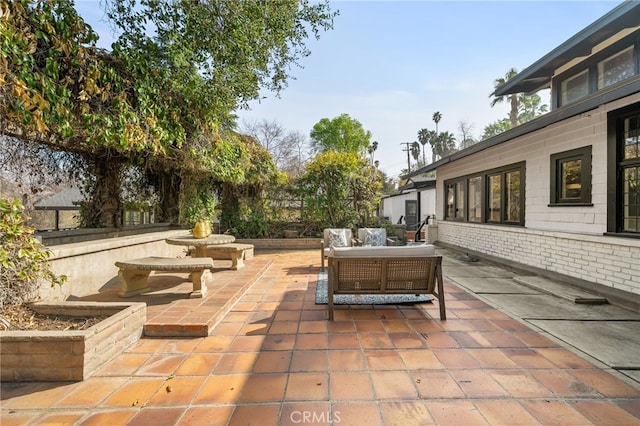 view of patio / terrace with an outdoor hangout area