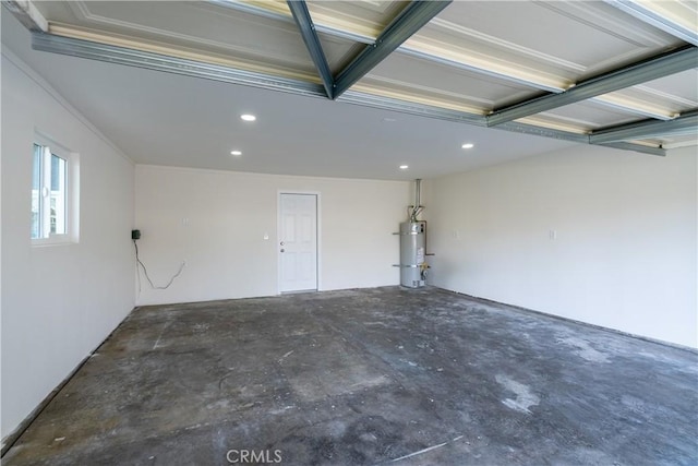 garage with strapped water heater