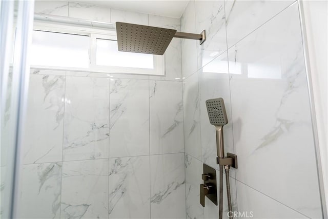 details with a tile shower