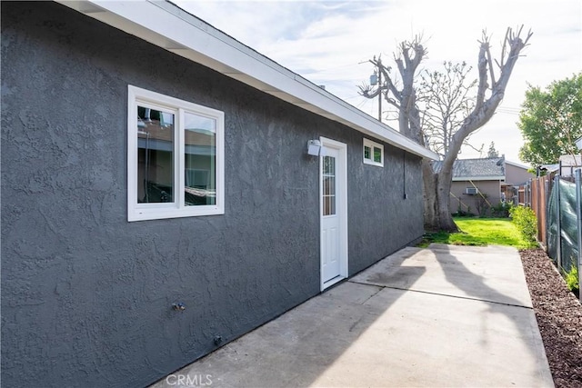 view of home's exterior featuring a patio area