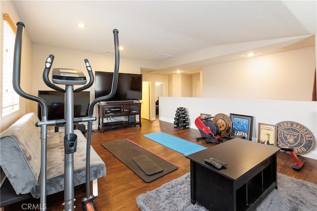 exercise area with dark hardwood / wood-style flooring