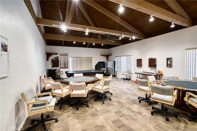 office space with wood ceiling, high vaulted ceiling, light carpet, and beamed ceiling