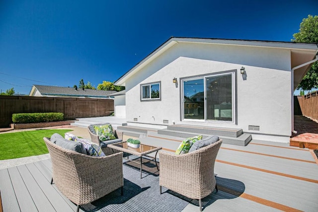 deck with an outdoor hangout area