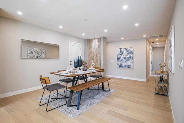 dining room with light wood-type flooring