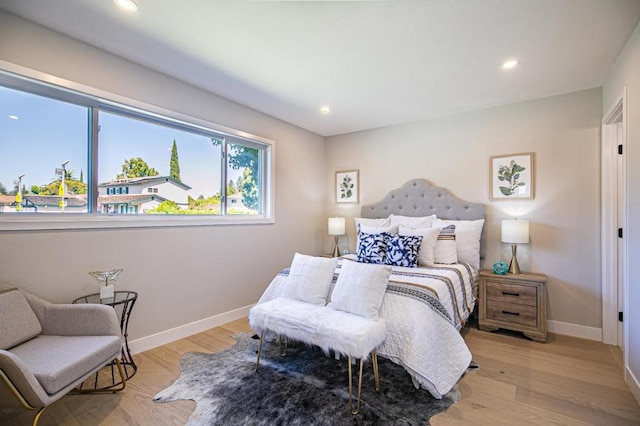 bedroom featuring light hardwood / wood-style flooring