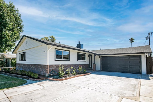 single story home with a garage