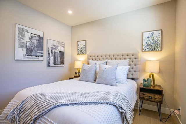 bedroom featuring wood-type flooring