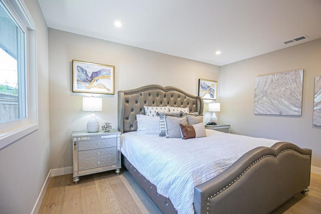 bedroom featuring light wood-type flooring