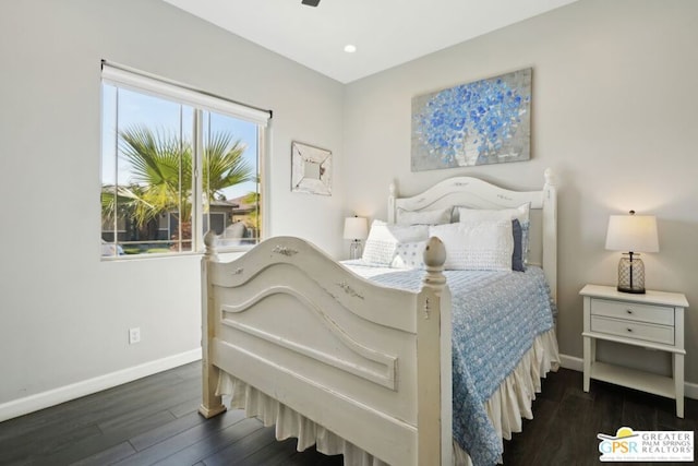 bedroom featuring dark hardwood / wood-style floors