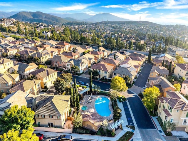 drone / aerial view featuring a mountain view