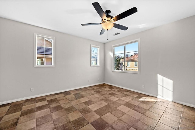 unfurnished room featuring ceiling fan