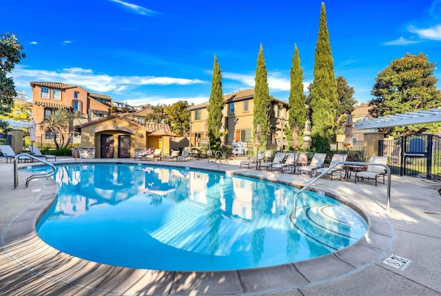 view of swimming pool with a patio area