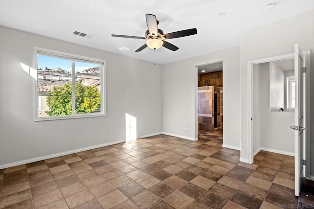 empty room with ceiling fan