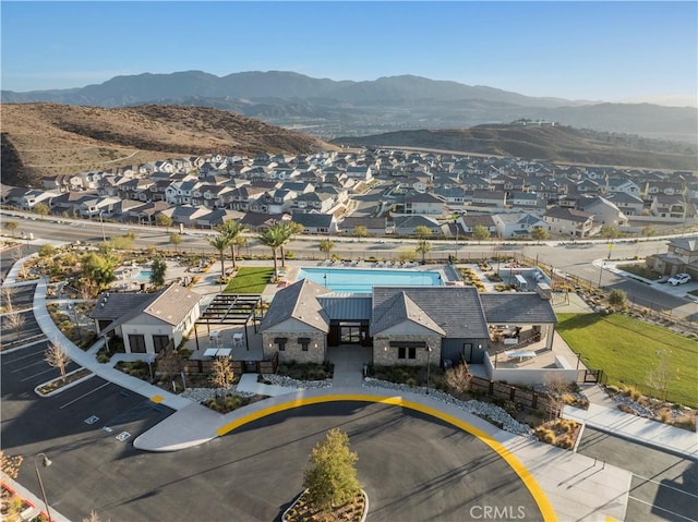 birds eye view of property featuring a mountain view