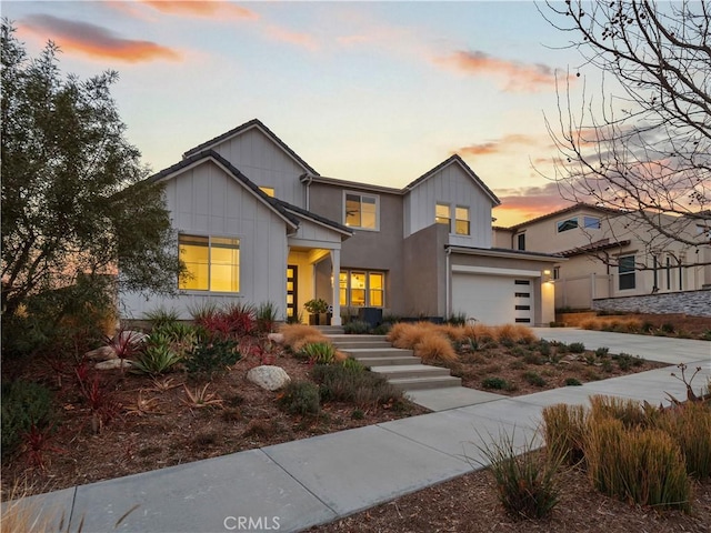 view of front of home with a garage