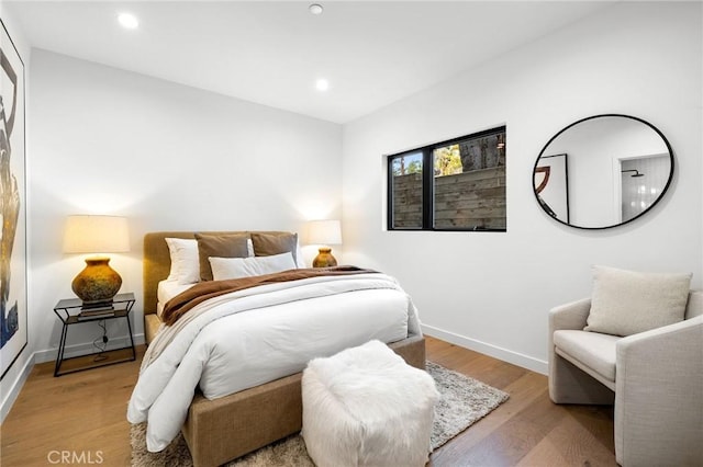 bedroom with light hardwood / wood-style floors