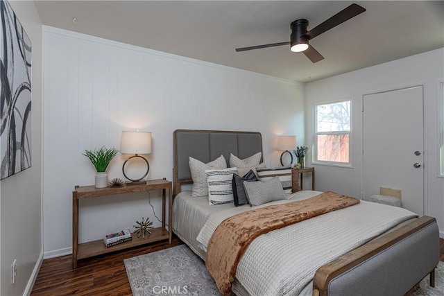 bedroom featuring dark hardwood / wood-style floors and ceiling fan