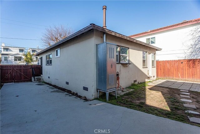 view of home's exterior with a patio