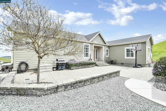 view of front of property featuring a patio area