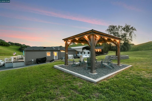 exterior space with a gazebo and a yard