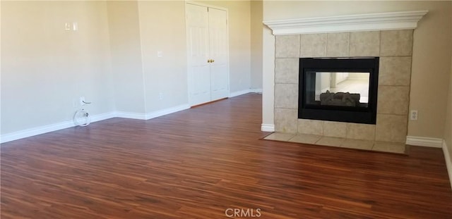 details with hardwood / wood-style floors and a fireplace