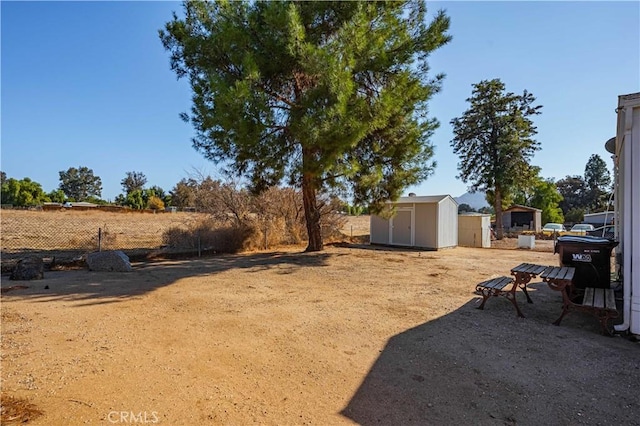 view of yard with a shed