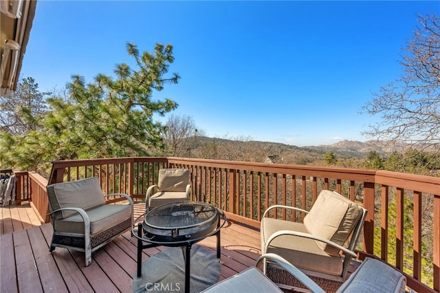 1430 Sequoia Dr, Lake Arrowhead, CA 92352 - deck featuring an outdoor fire pit and a mountain view