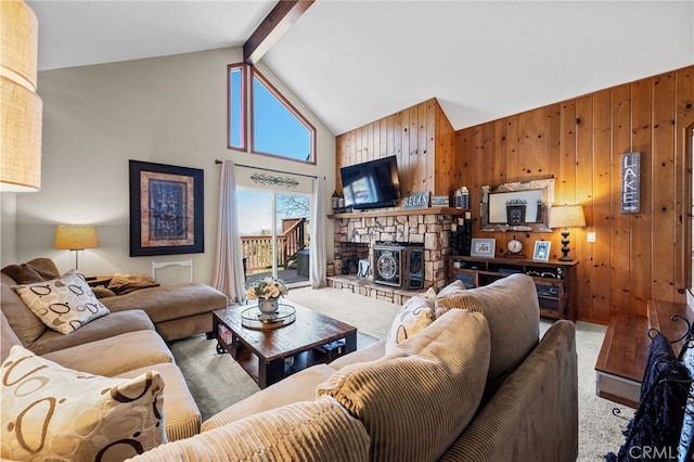 1430 Sequoia Dr, Lake Arrowhead, CA 92352 - living area with carpet floors, wood walls, high vaulted ceiling, beam ceiling, and a fireplace