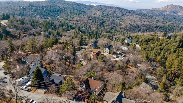 1430 Sequoia Dr, Lake Arrowhead, CA 92352 - drone / aerial view of a mountain backdrop and a heavily wooded area